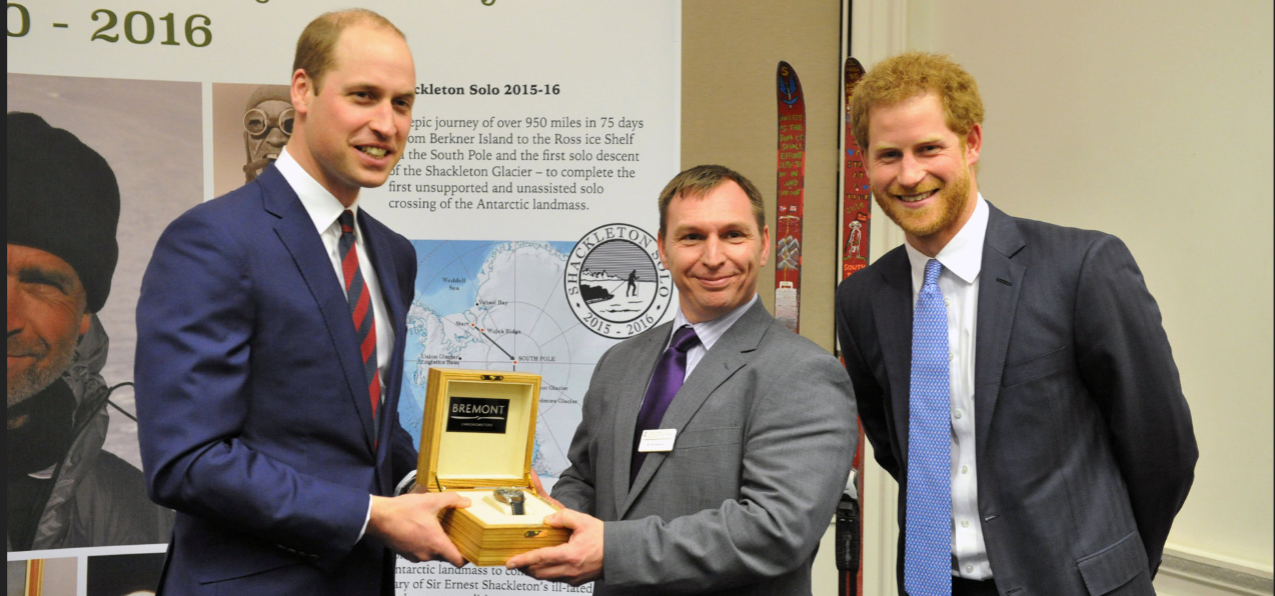 Prince William and Prince Harry presenting Bremont watcch to Sergeant Alan Robinson